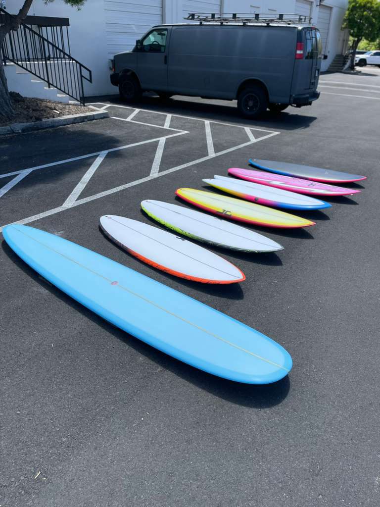 Fresh boards lined up outside the shaping studio